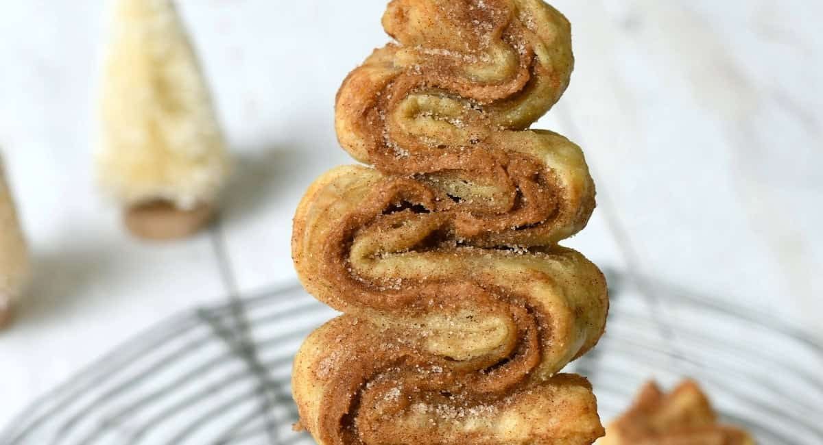 Up close image of cookie butter puff pastry Christmas trees.