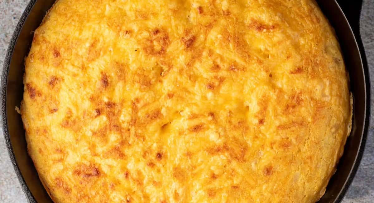 Overhead image of cast iron skillet jalapeno cheddar cornbread.