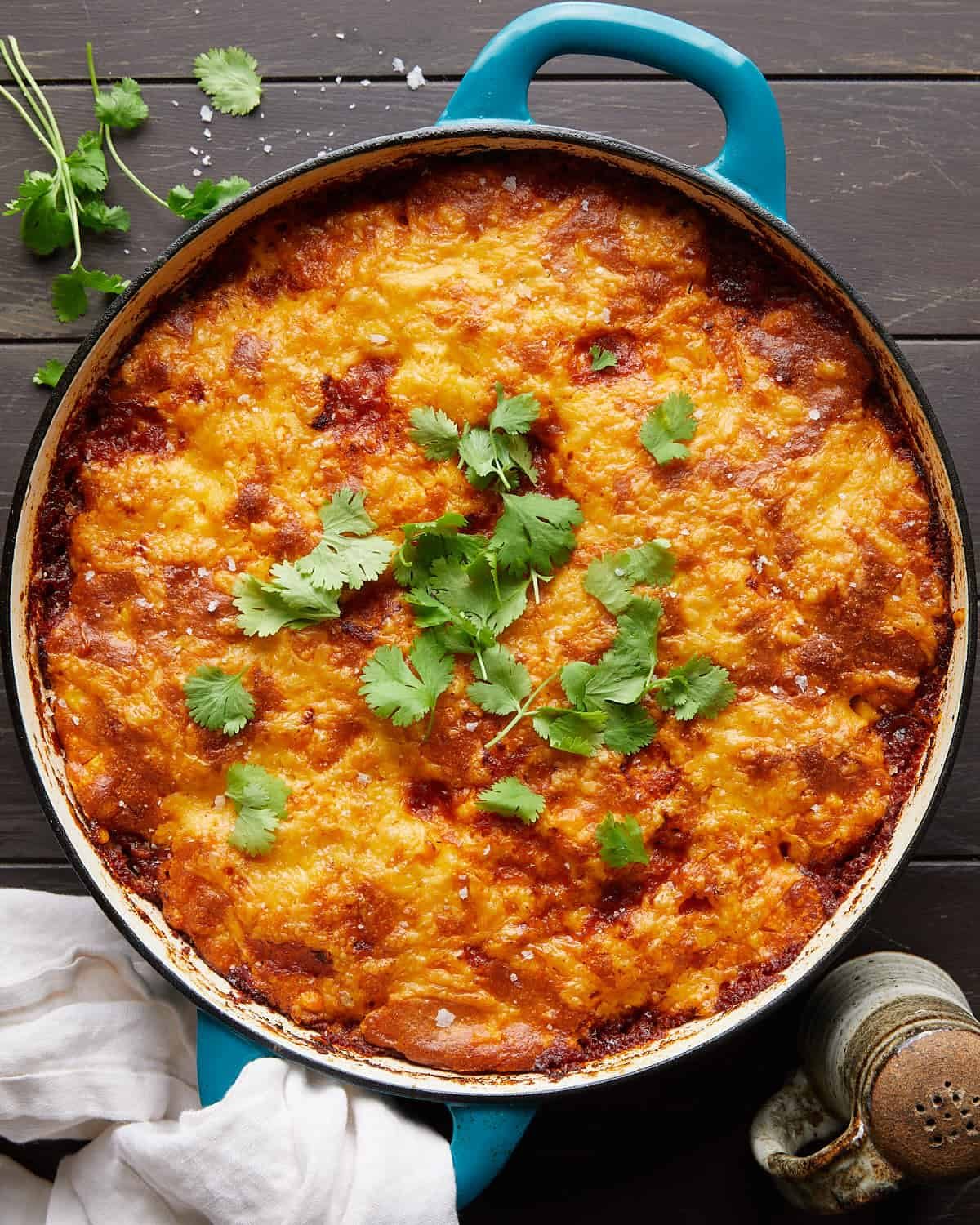 Overhead image of cornbread cowboy casserole with garnish.