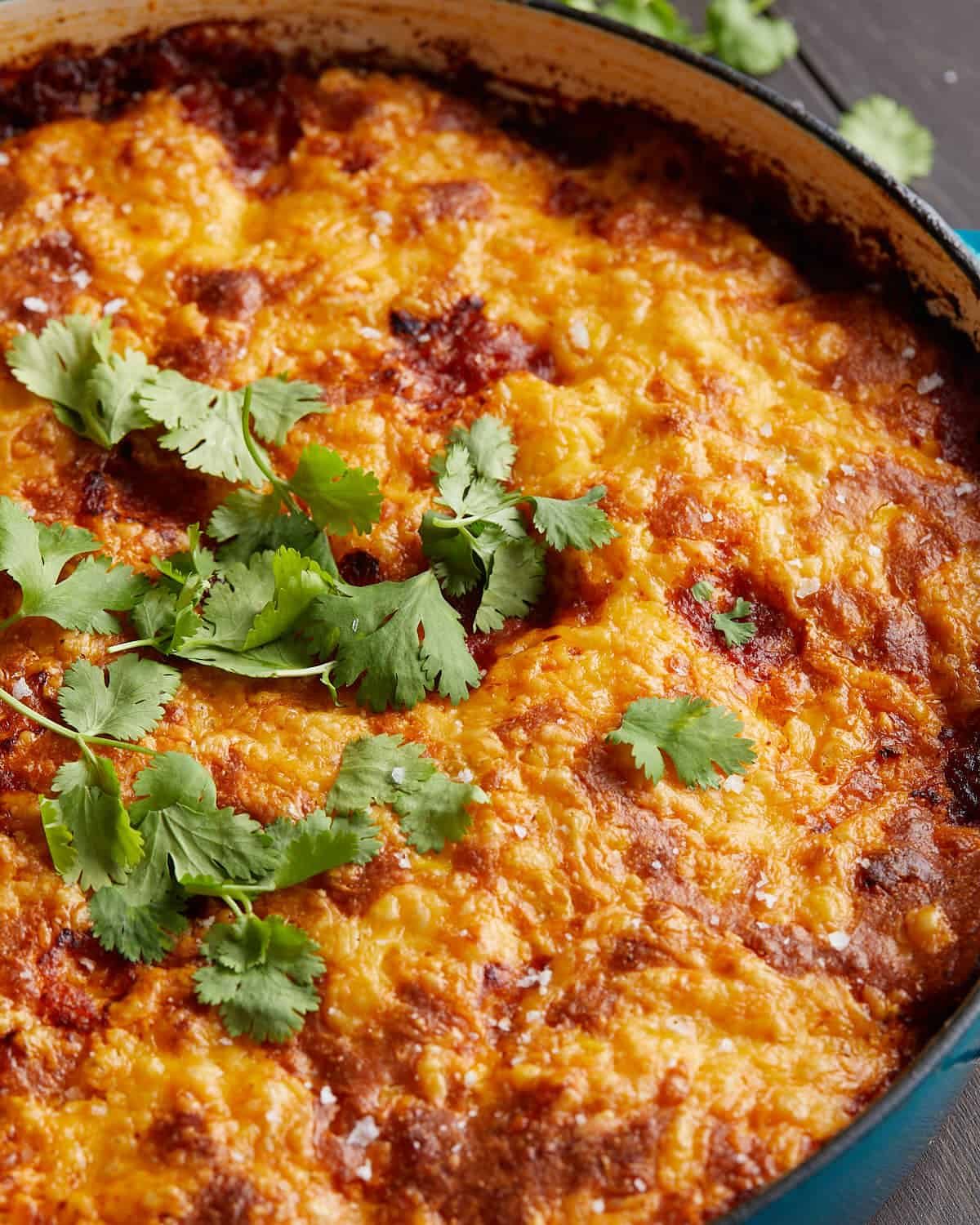 Up close image of cornbread cowboy casserole with garnish.