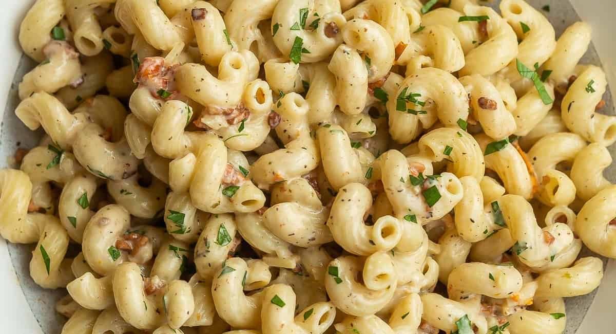 Overhead image of creamy cavatappi pasta.