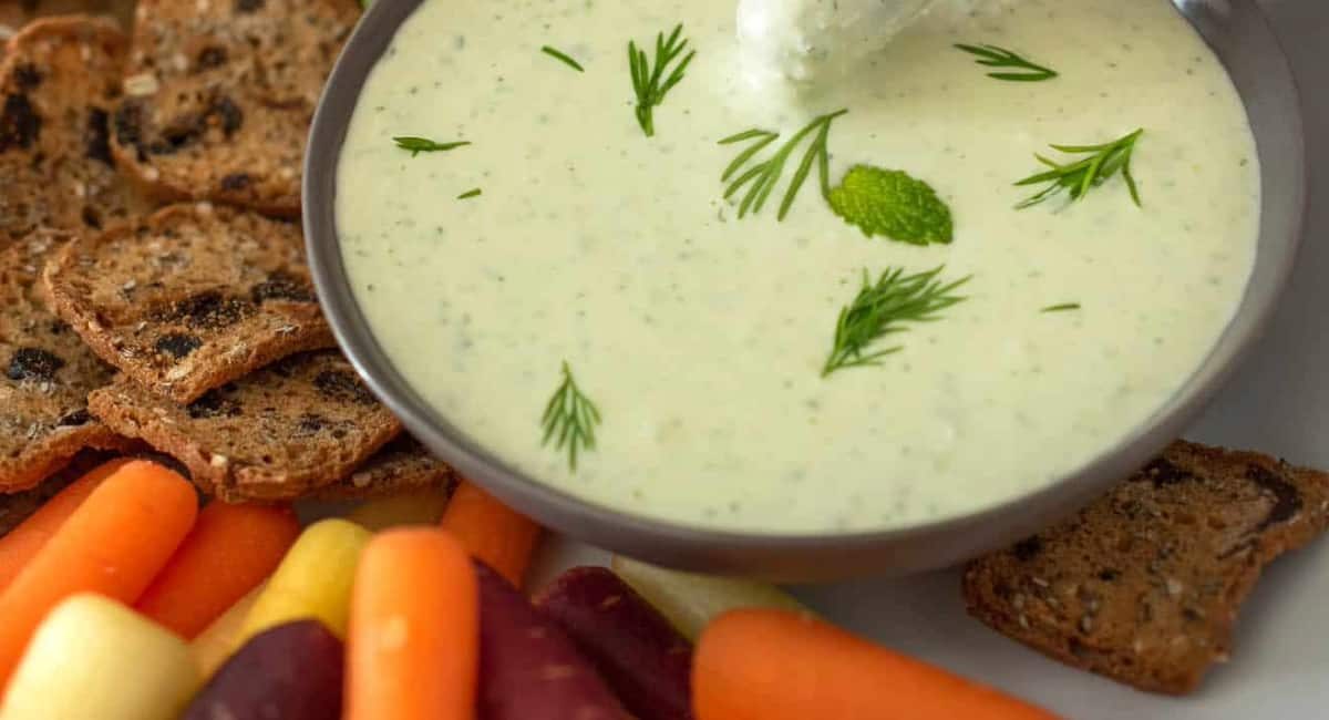 Overhead image of creamy tzatziki dipping sauce.