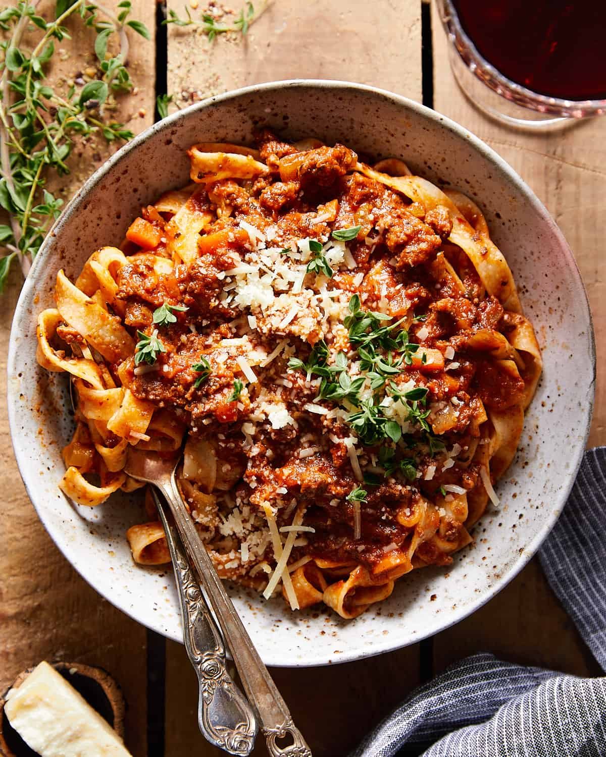 Overhead shot of creamy bolognese over pasta.