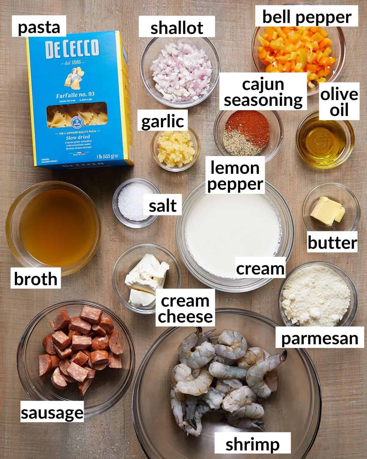 Image of ingredients needed to make creamy cajun shrimp and sausage pasta.