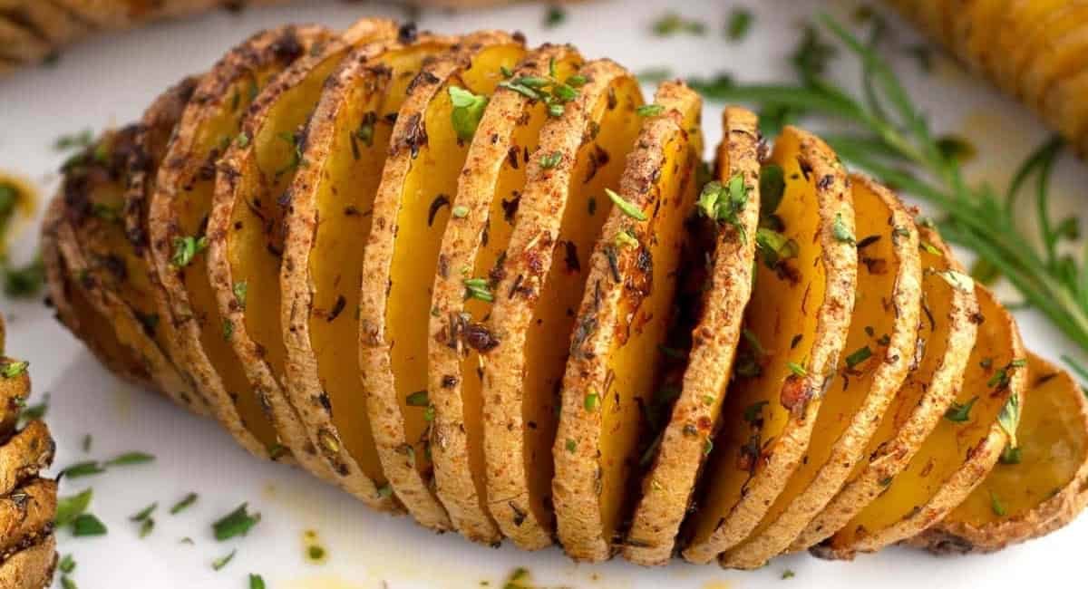 Up close image of crispy hasselback potatoes.
