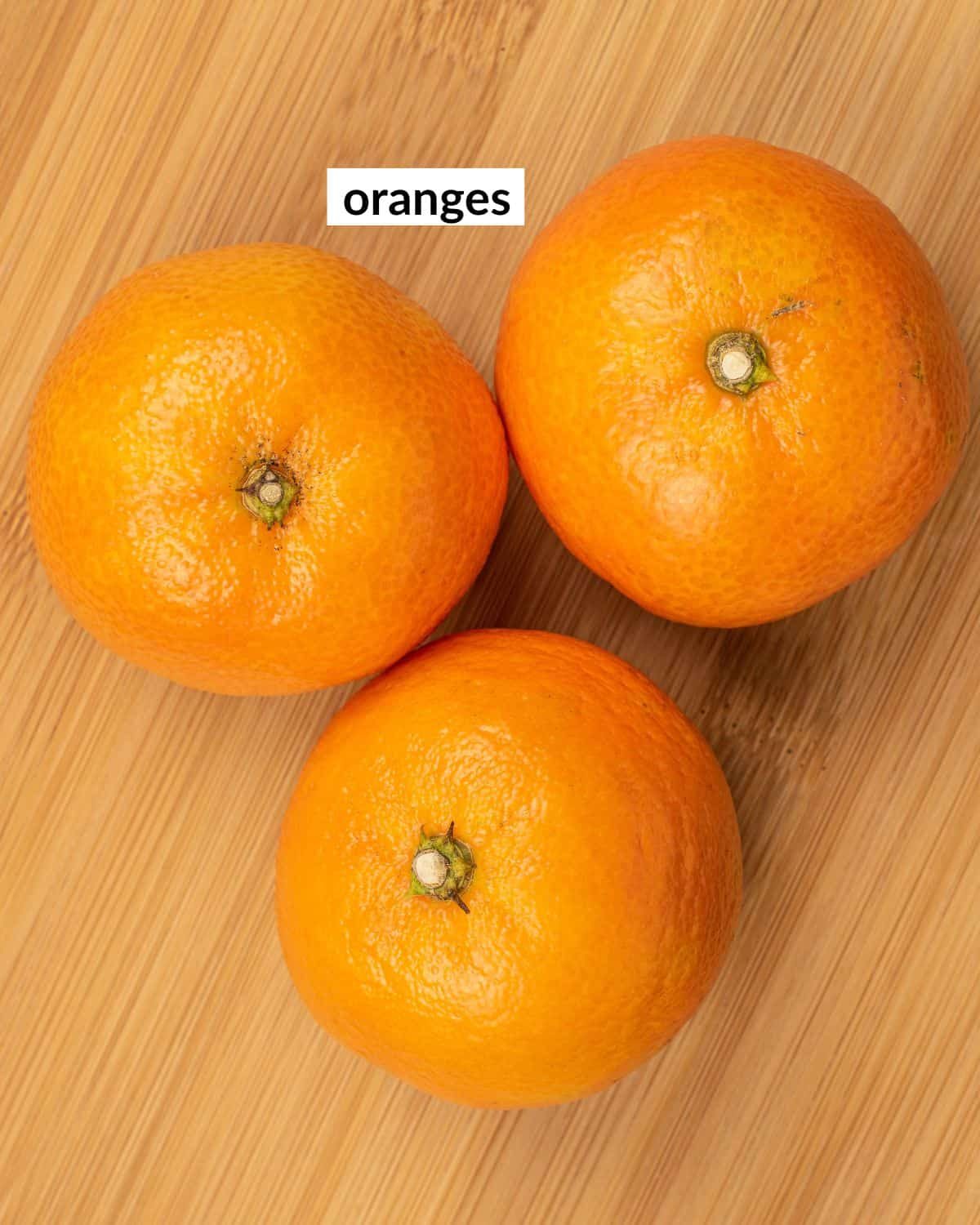 Overhead image of ingredients needed to make dry oranges.