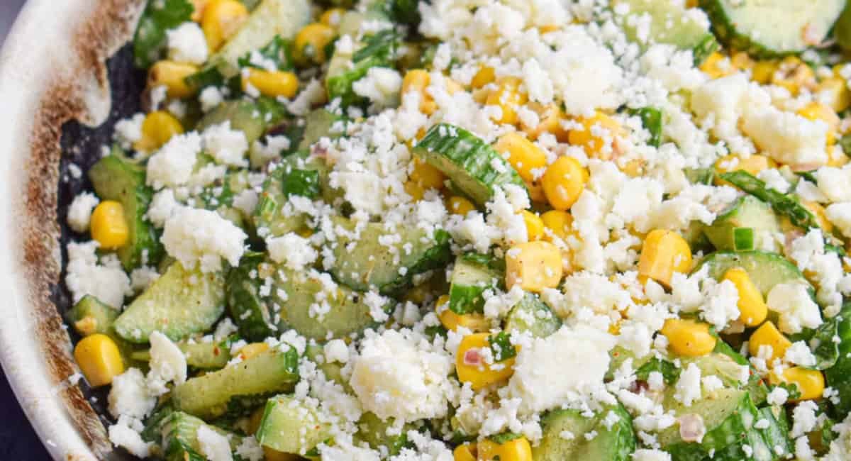 Up close image of tex-mex cucumber and corn salad.
