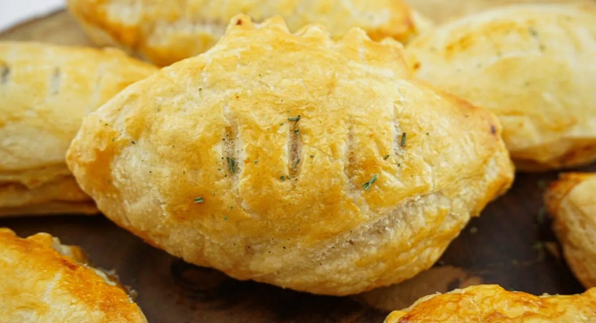 Up close image of football pizza puff pastries.