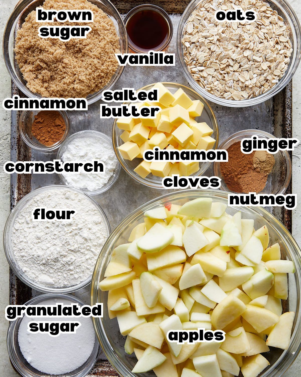 Overhead image of ingredients needed for dutch oven apple crisp.