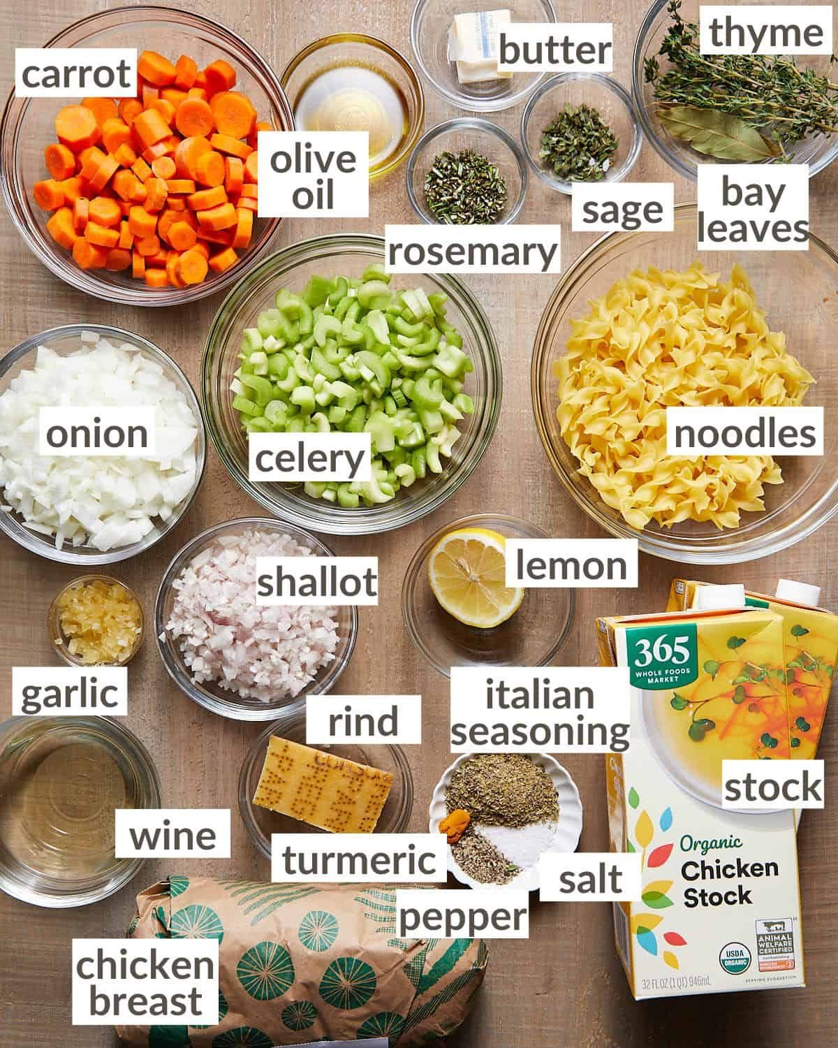 Ingredients needed to make dutch oven chicken noodle soup in glass bowls