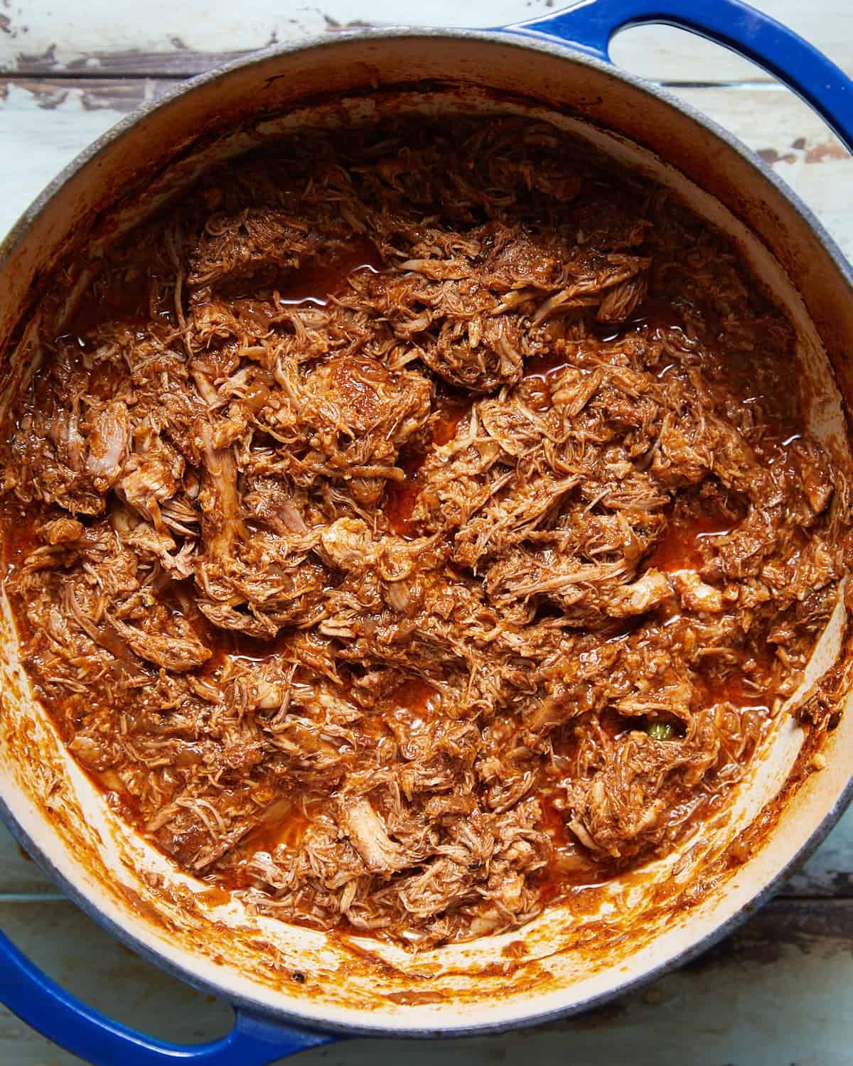 Pulled pork in blue dutch oven.