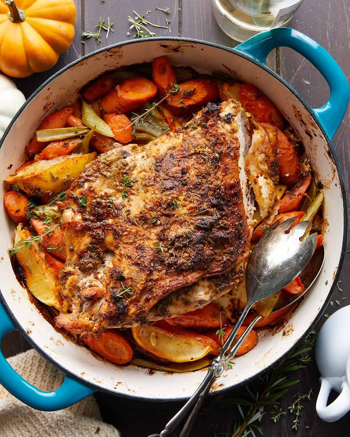 Overhead image of dutch oven turkey breast with vegetables.