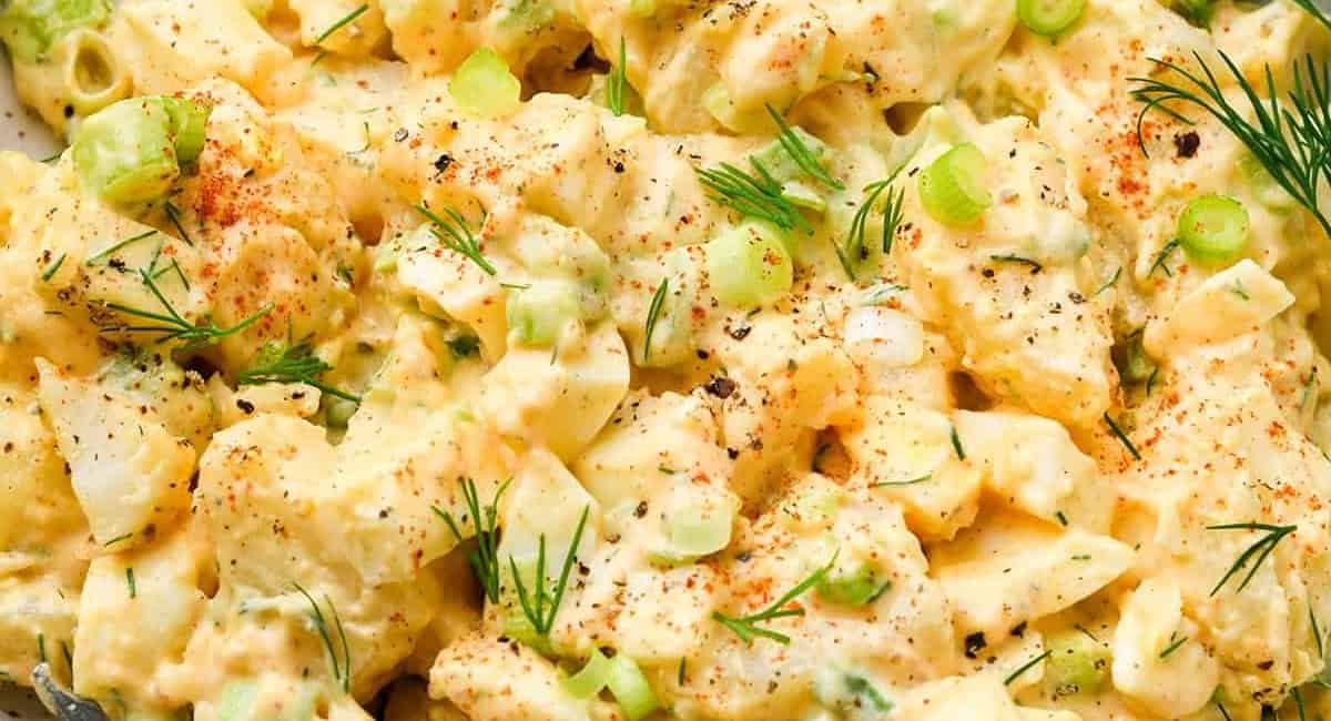 Up close image of potato salad with garnish.