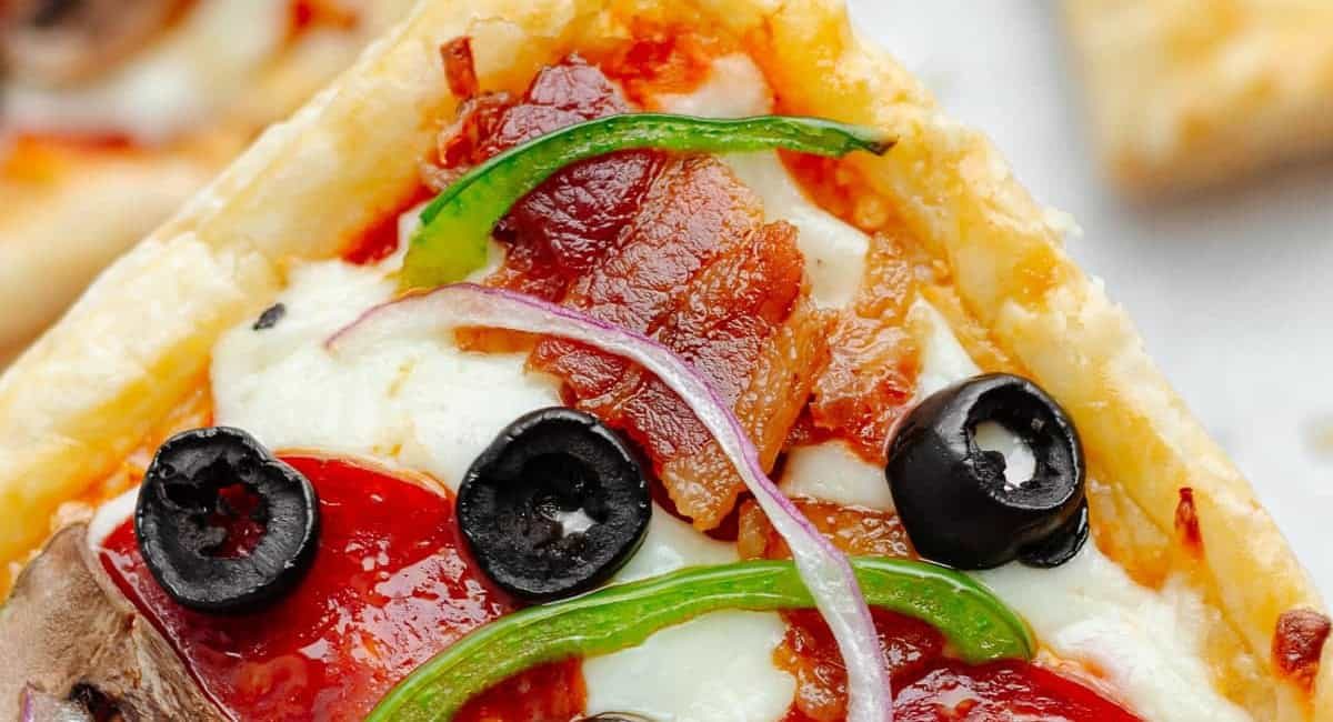Up close image of puff pastry pizza.