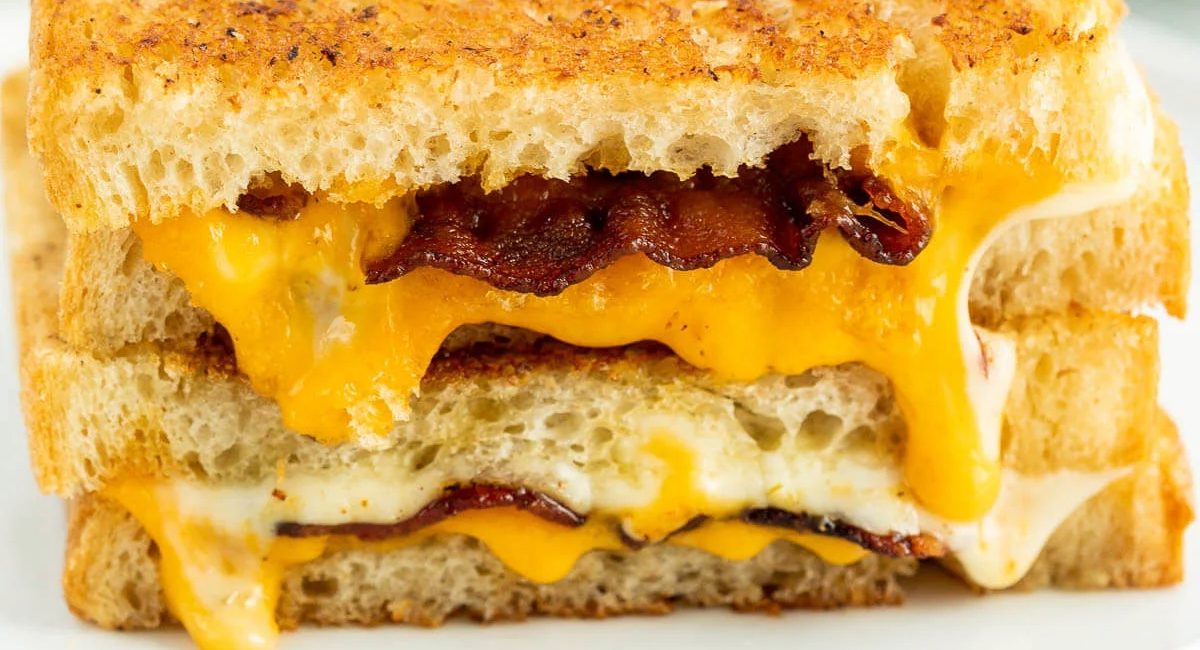 Up close image of bacon grilled cheese sandwich.