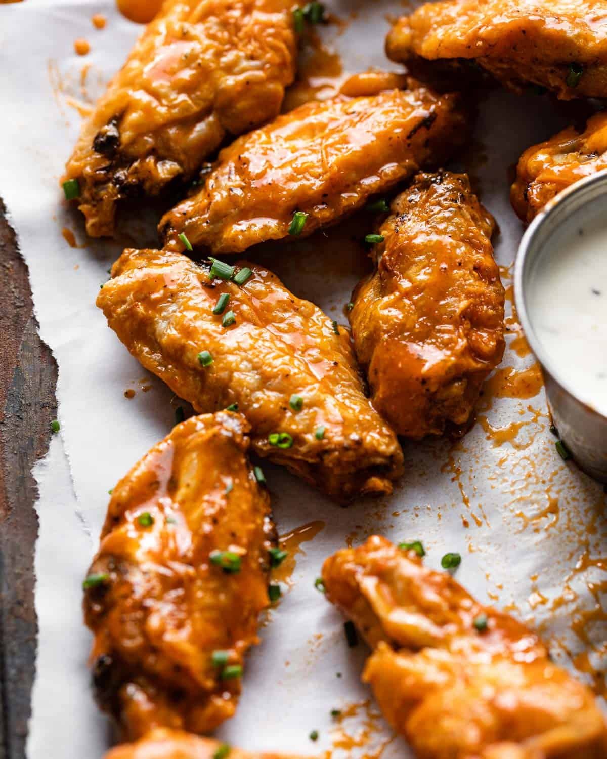 closeup shot of cooked frozen chicken wings in air fryer