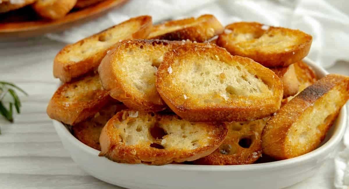 Close up image of garlic crostini.