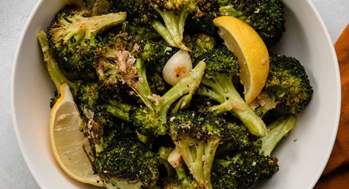 Overhead image of lemon parmesan roasted broccoli with garlic.