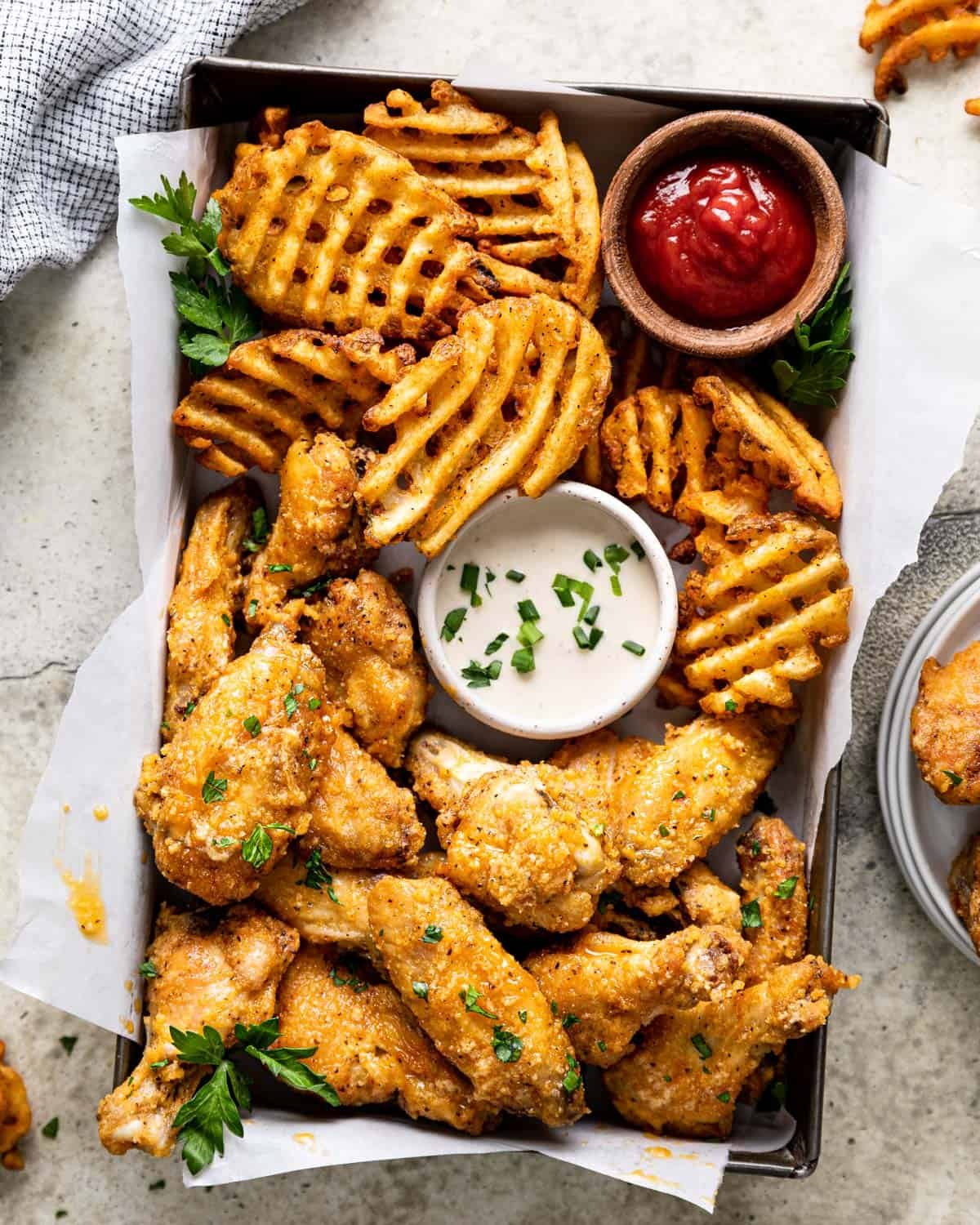 Overhead image of air fryer garlic parmesan wings.
