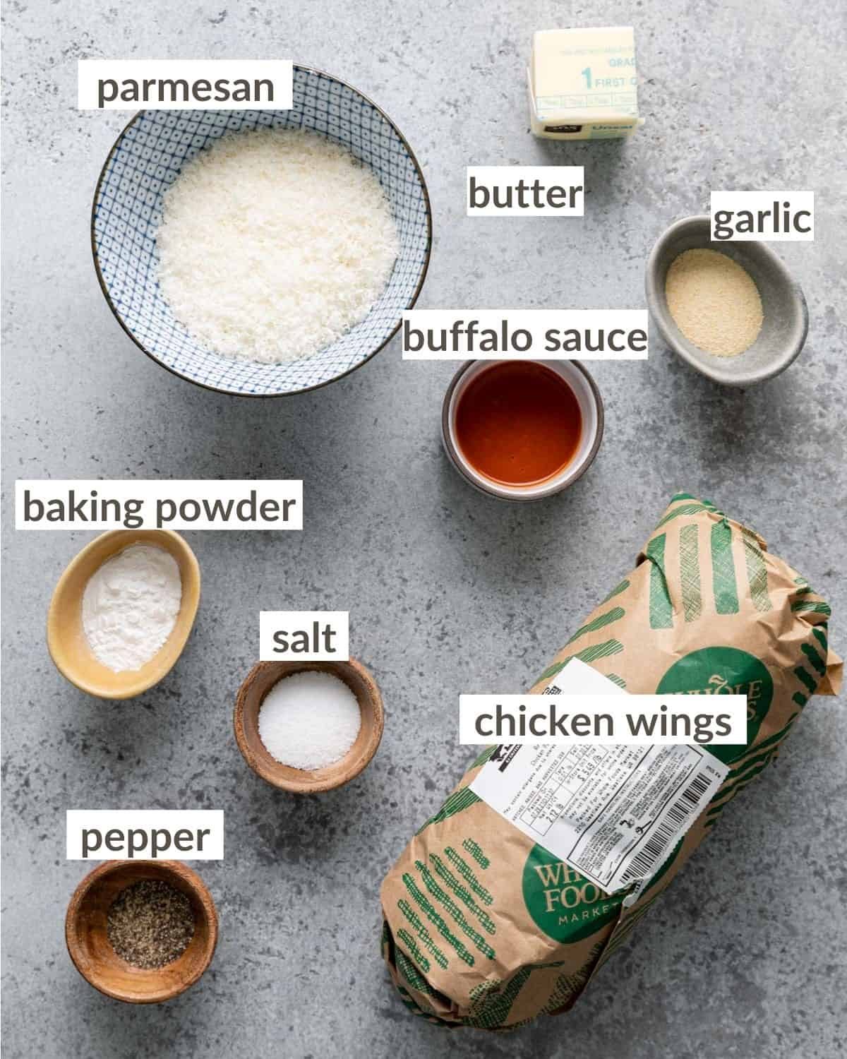 Overhead image of ingredients needed to make air fryer garlic parmesan wings.