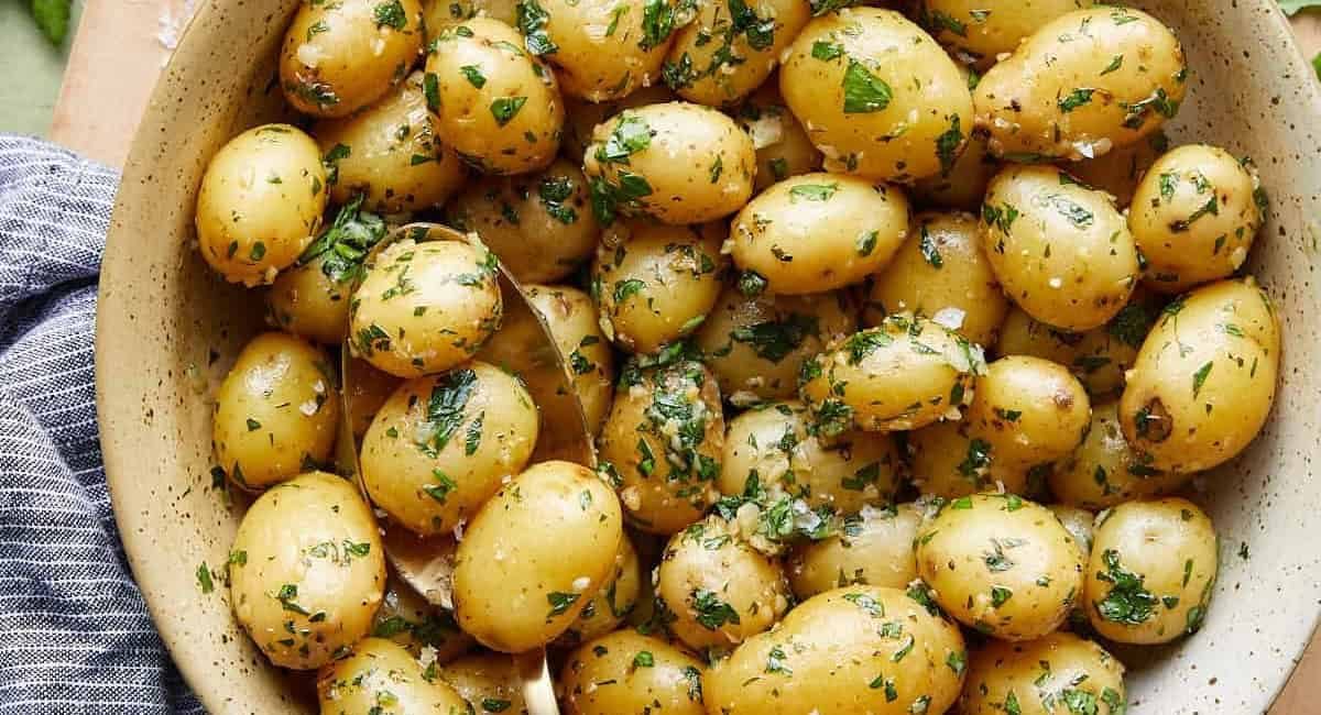 Overhead image of garlic parsley potatoes.