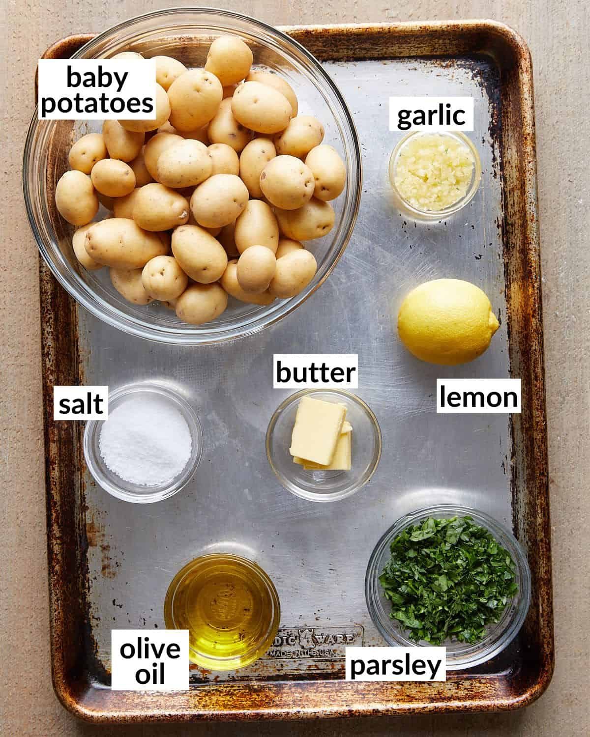 Overhead image of ingredients needed for garlic parsley potatoes.