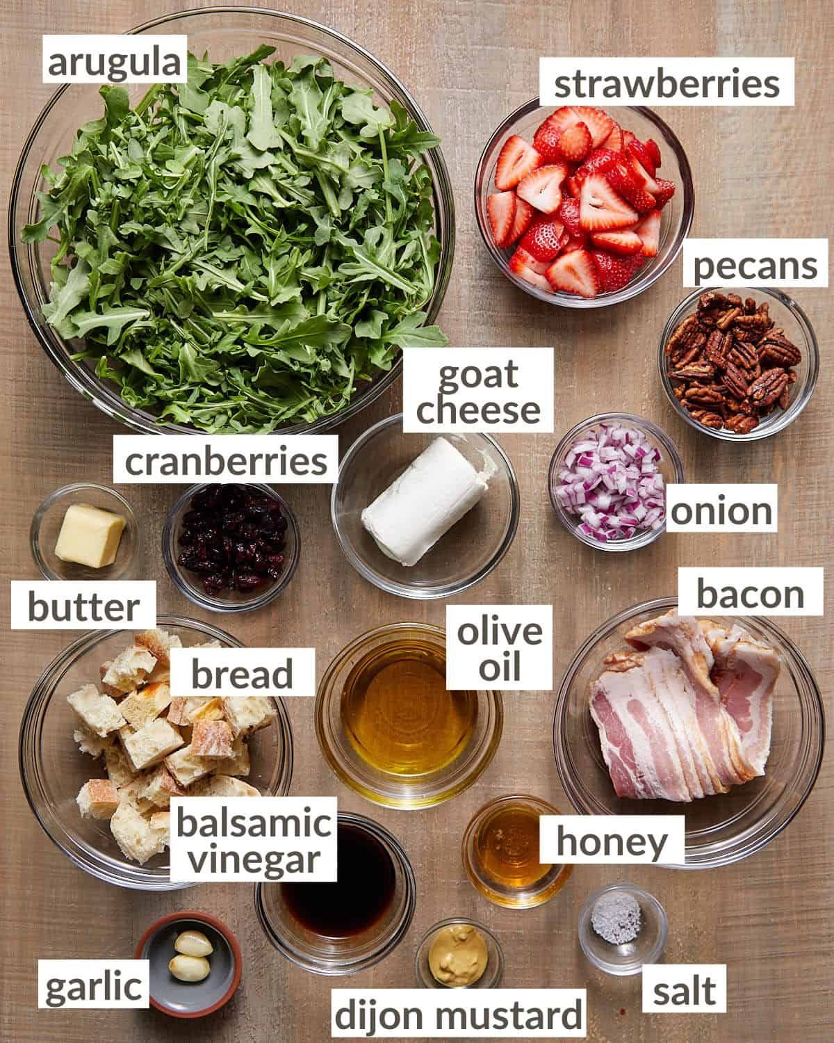Ingredients needed to make arugula goat cheese salad.
