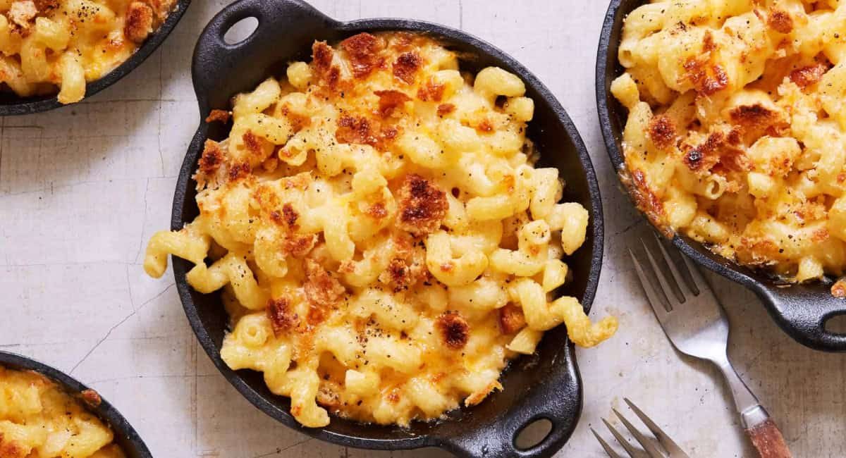 Overhead image of creamy baked cheddar and smoked gouda mac and cheese.