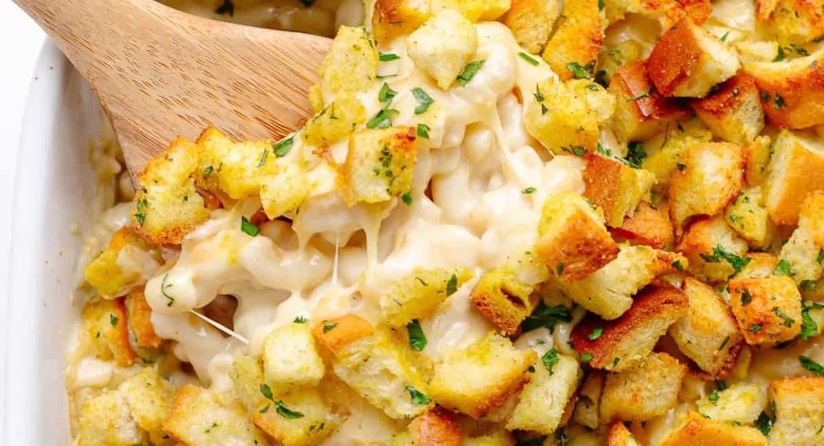 Overhead image of gouda mac and cheese recipe with garnish.