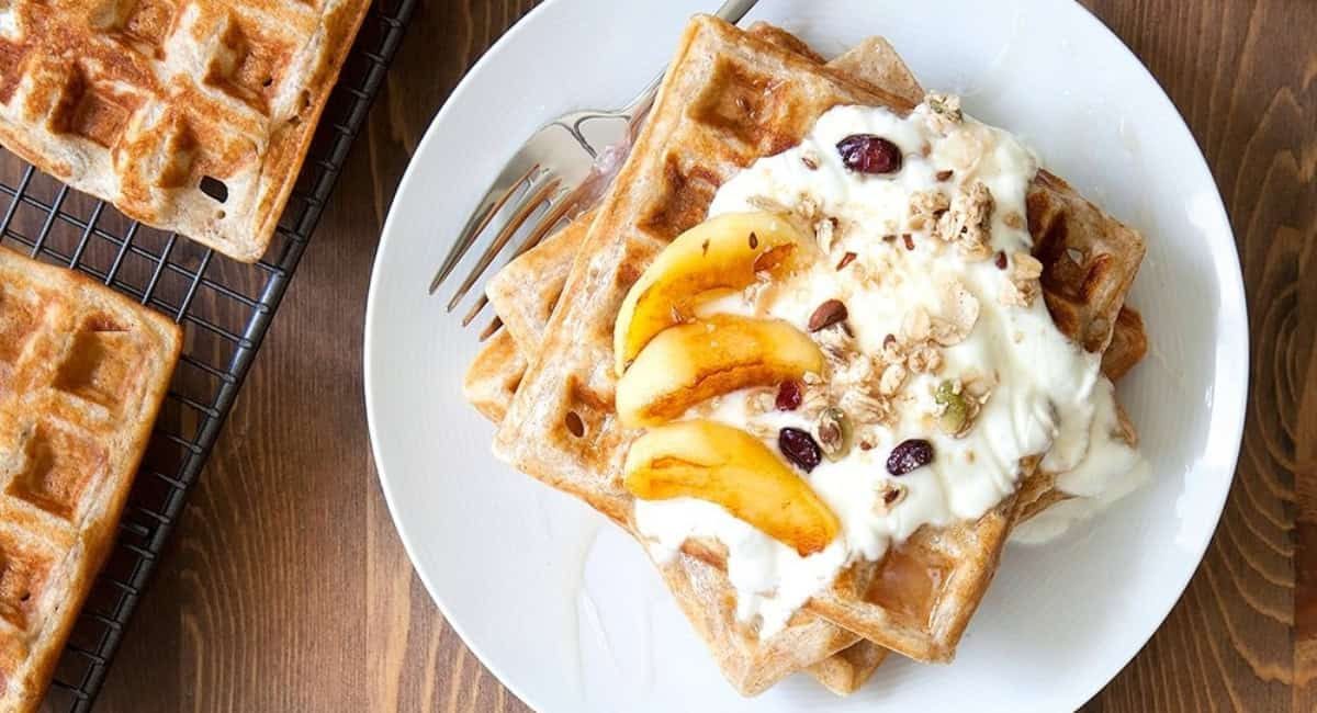 Overhead image of granola waffles with coconut fried apples