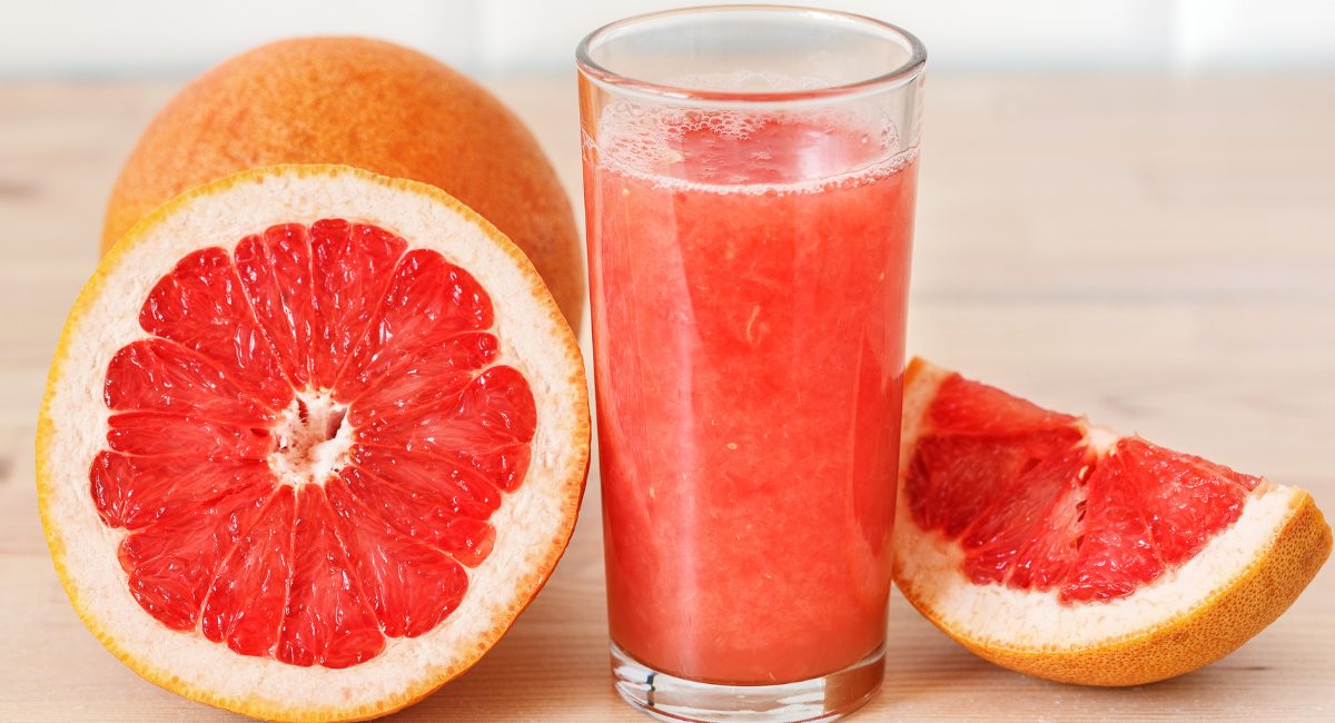 Up close image of grapefruit juice.
