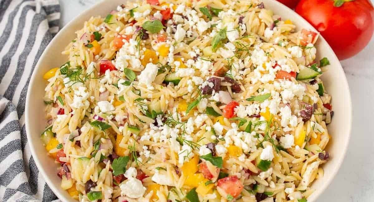 Overhead image of Greek orzo pasta salad.