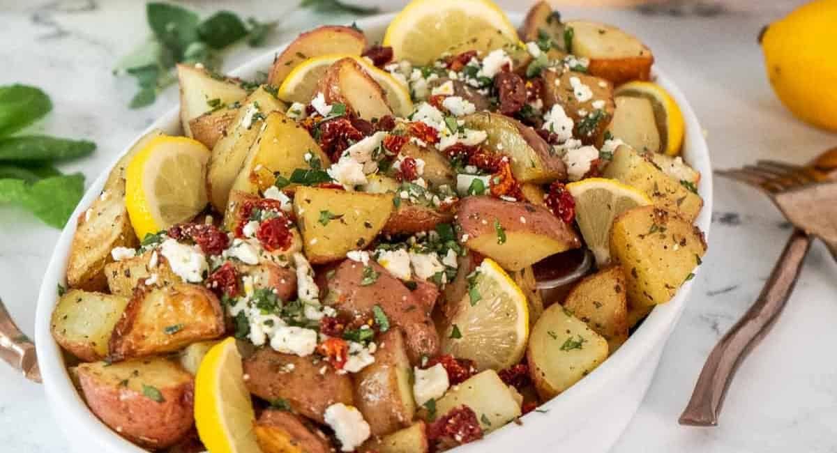 Overhead image of Greek roasted potatoes with feta.