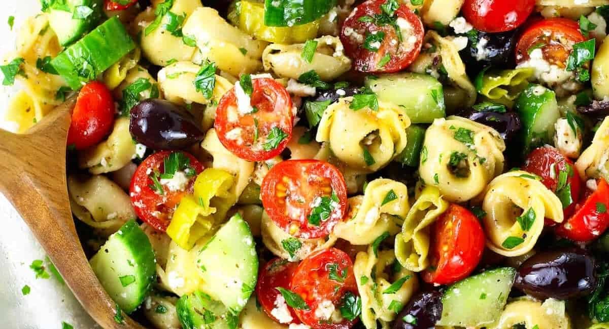 Overhead image of greek tortellini pasta salad.