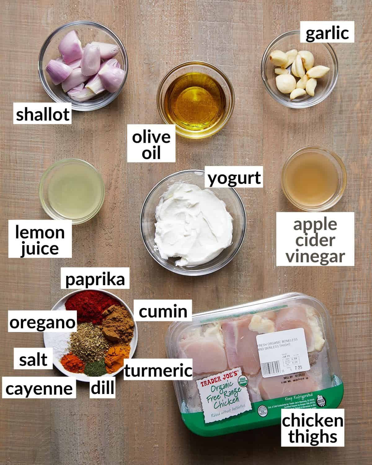 Ingredients needed for greek yogurt chicken in glass bowls.