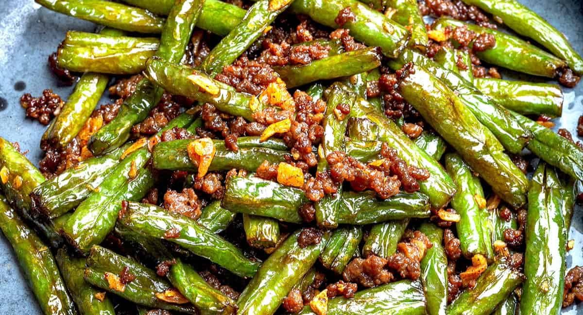 Overhead image of Chinese green beans and ground beef recipes.