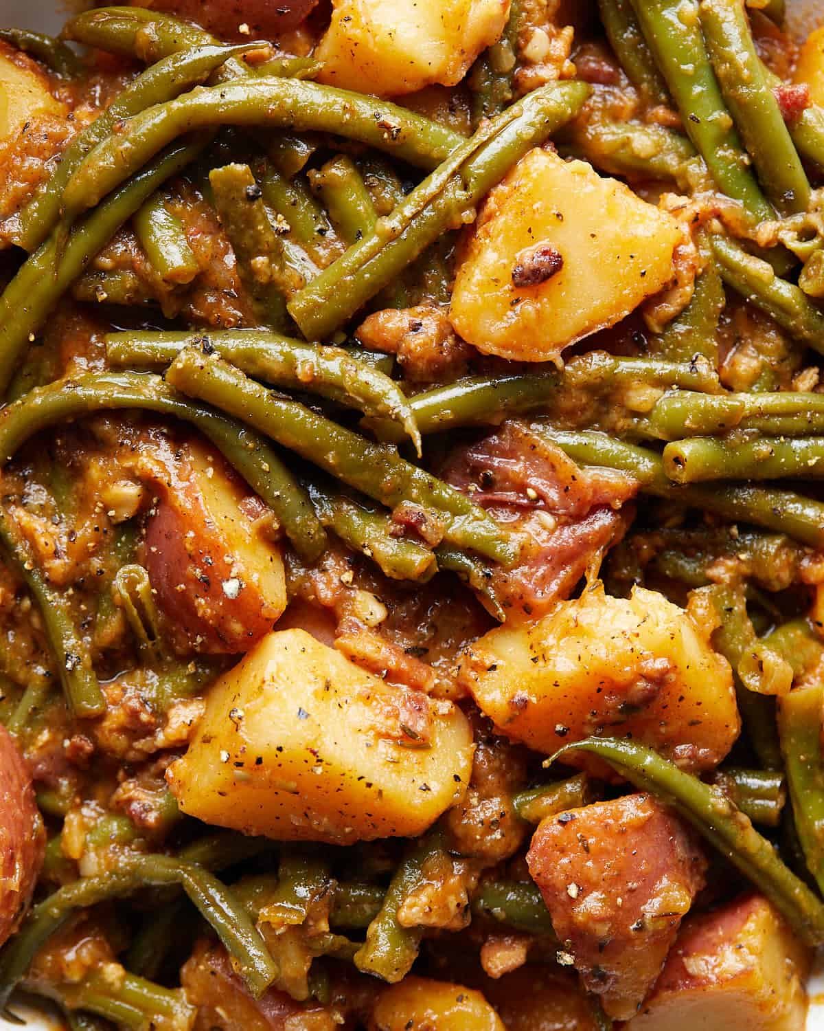 Up close image of green beans and potatoes recipe.