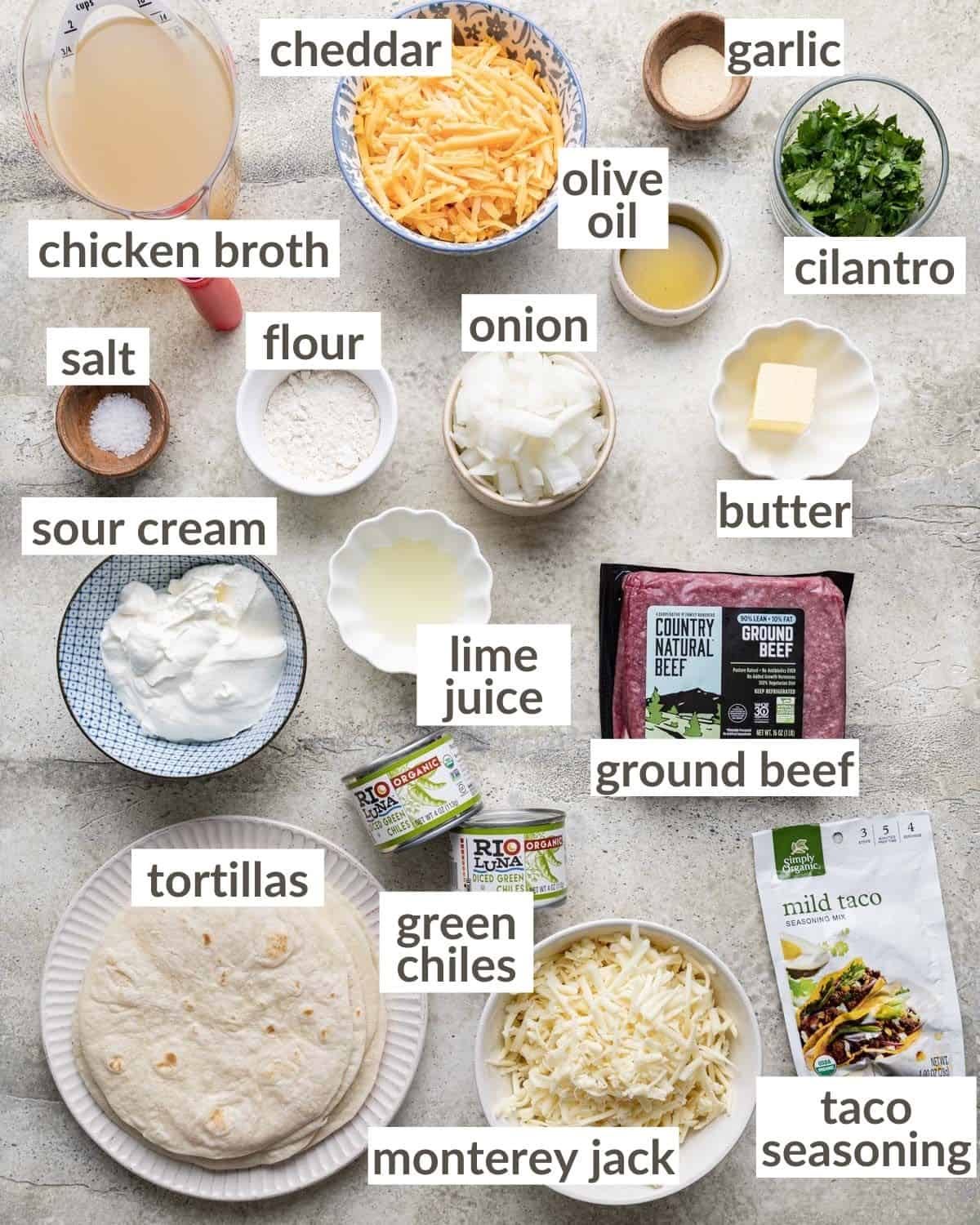 Ingredients needed to make green chili beef enchiladas with white sauce.