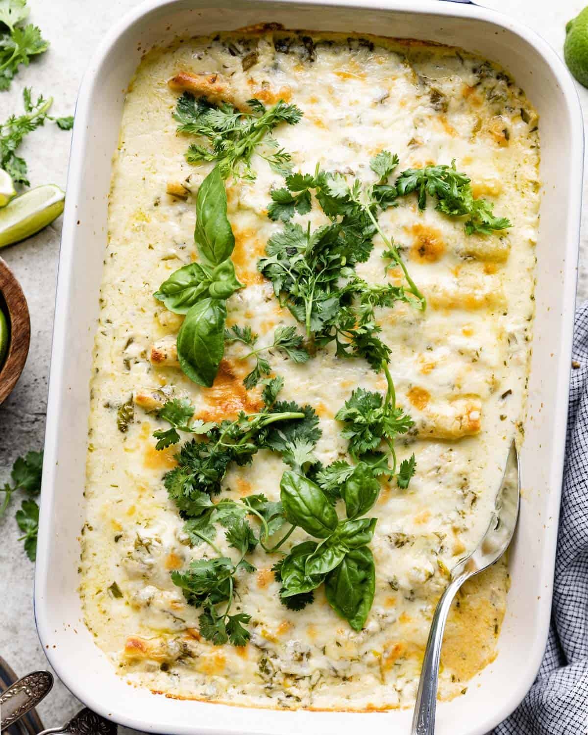 White beef enchiladas in a casserole dish.