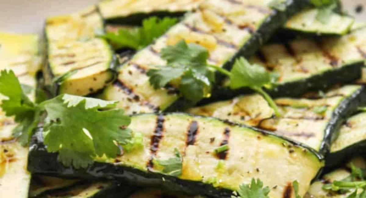 Up close image of grilled zucchini slices.