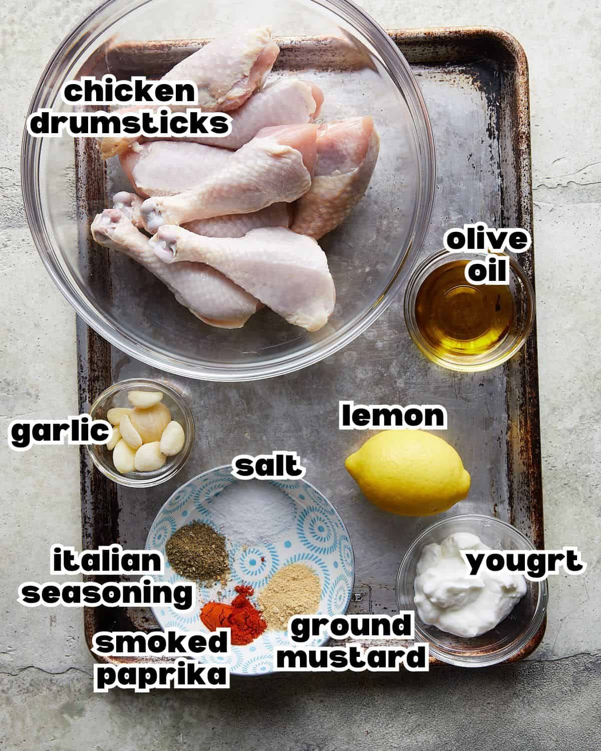Overhead image of ingredients needed to make grilled chicken drumsticks.