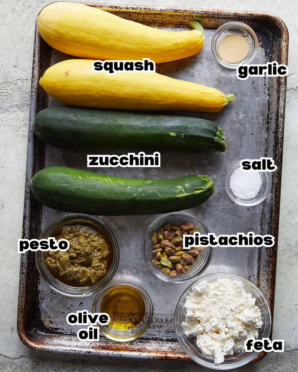 Overhead image of ingredients needed to grilled zucchini and yellow squash recipe.