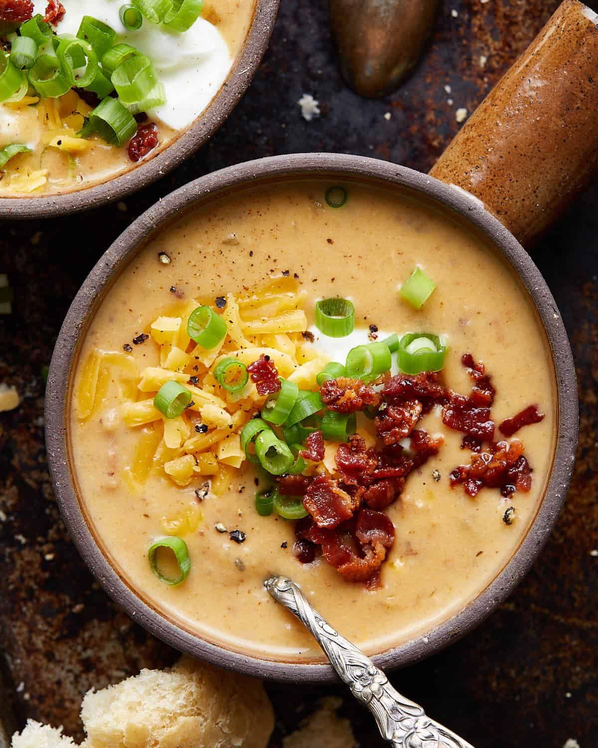 Up close overhead image of crockpot potato soup with hash browns.