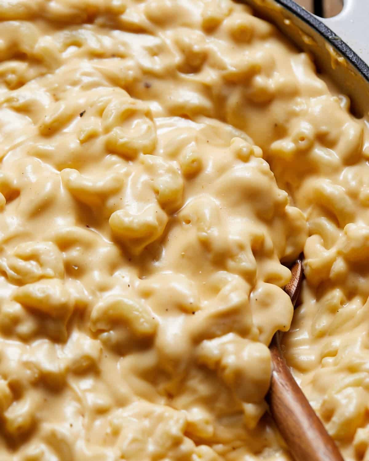 Mac and cheese on a spoon.