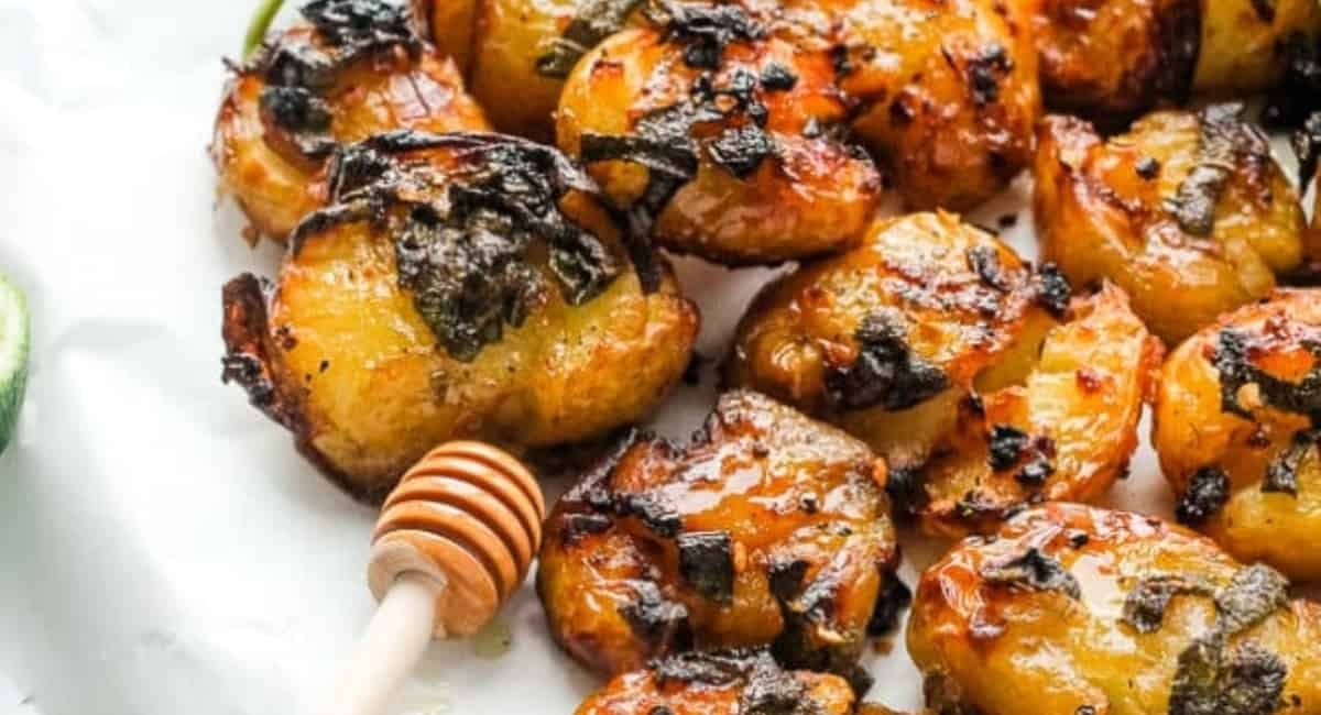 Up close image of hot honey smashed potatoes.