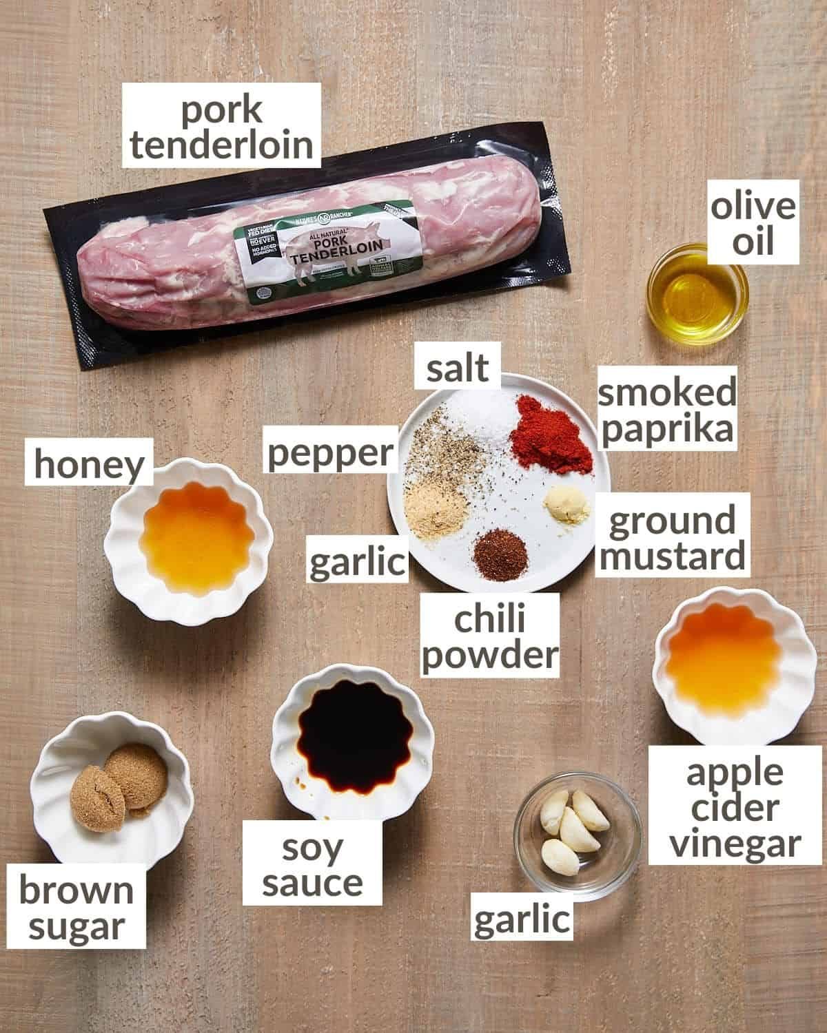 Ingredients needed to cook baked pork tenderloin in bowls.