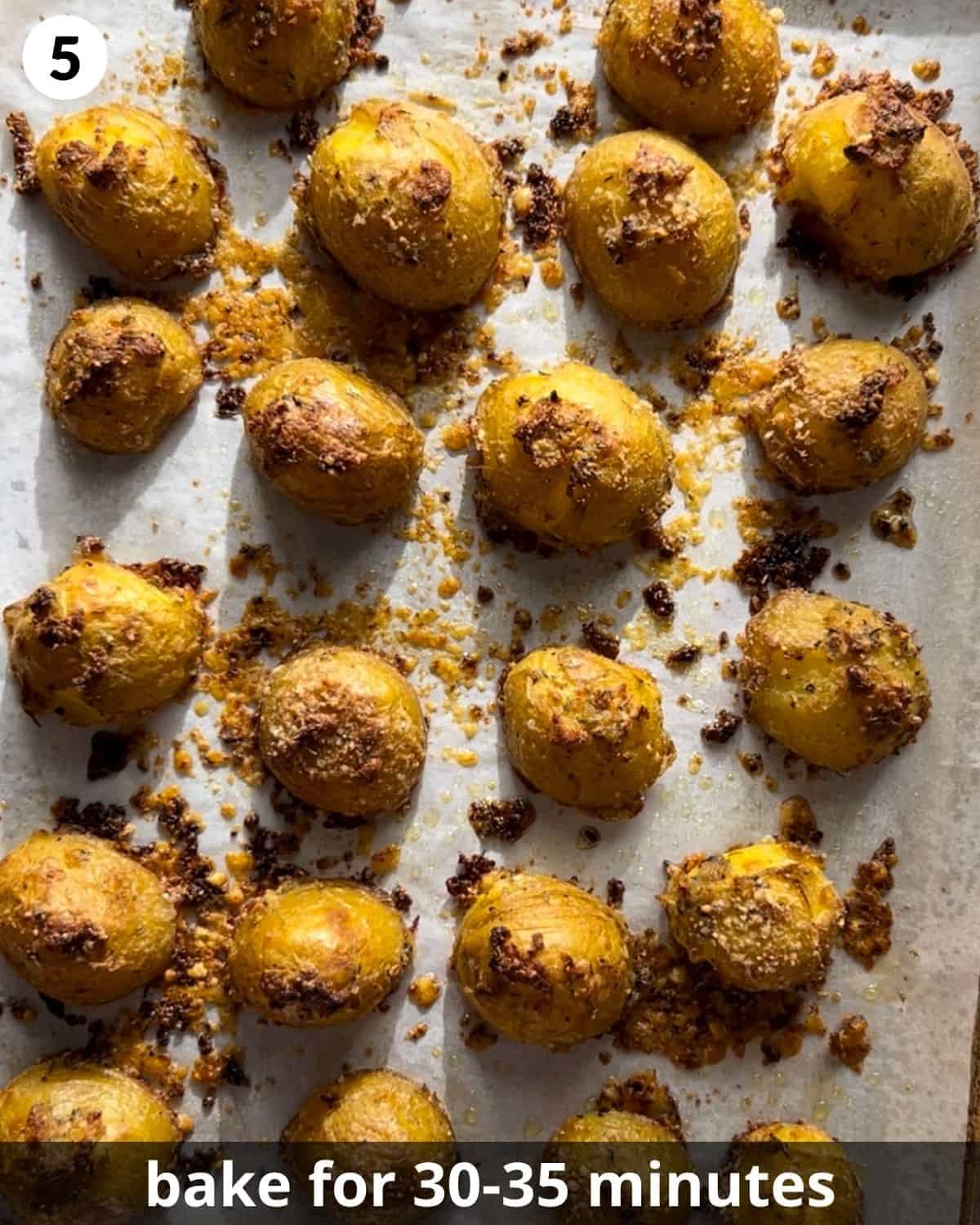 Roasted yukon gold potatoes on the baking sheet.
