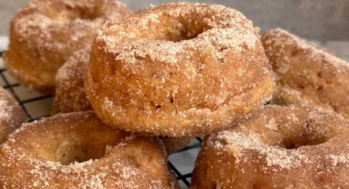 Up close image of old fashioned baked cinnamon sugar donuts.