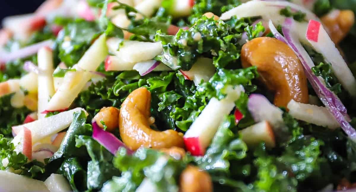 Up close image of apple kale slaw.