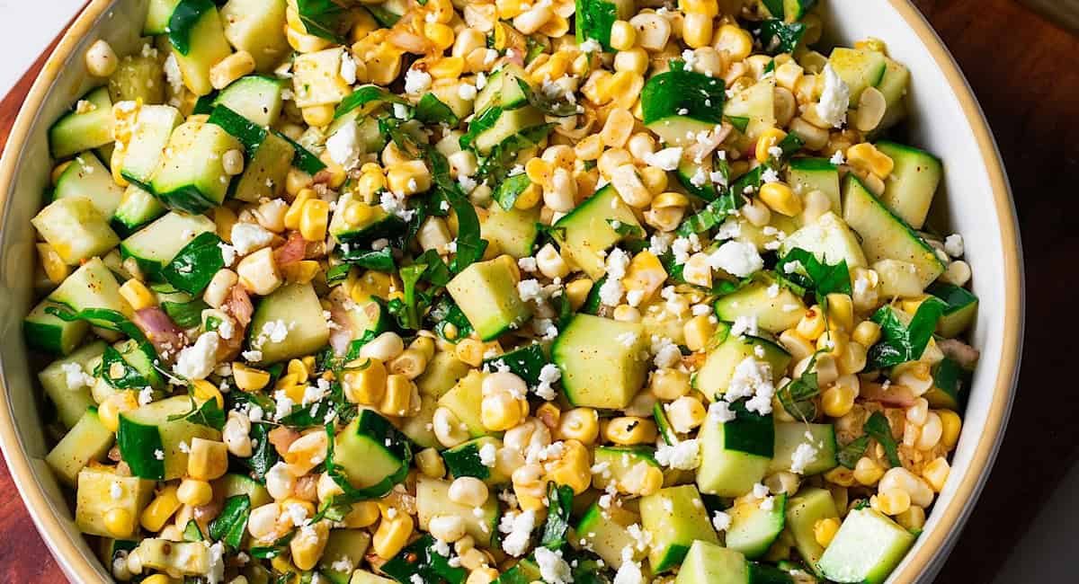 Overhead image of summer corn and cucumber salad.